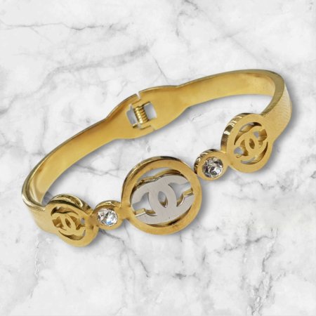 Chanel Bracelet - ذهبي مع فضي عريض