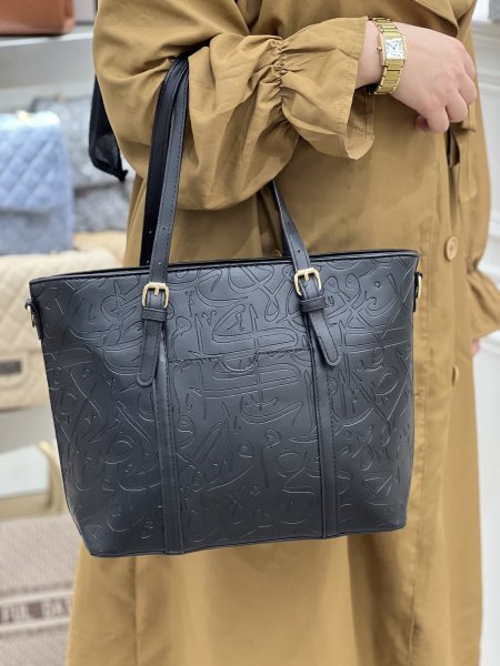 شنطة شهيرة / مكتب لغة كوالتي عالي